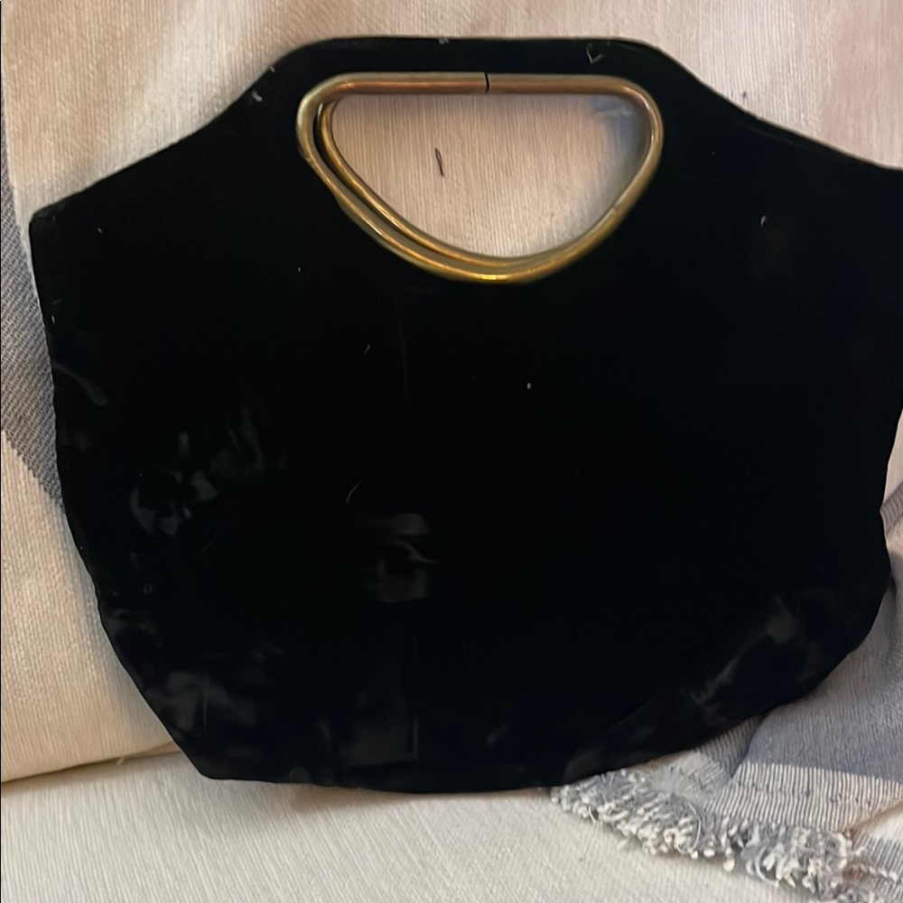 Elegant Black Handbag with Gold Accents